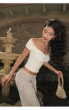 ITSNIKAR Pearl Henry French Sexy Short Sleeve T-Shirt Women's Slim One-Shoulder Cropped Knitted Off-the-Shoulder Top (Copy)